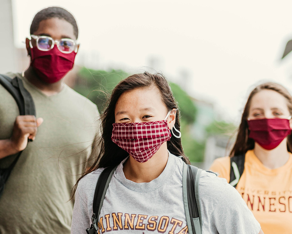 students wearing masks on campus